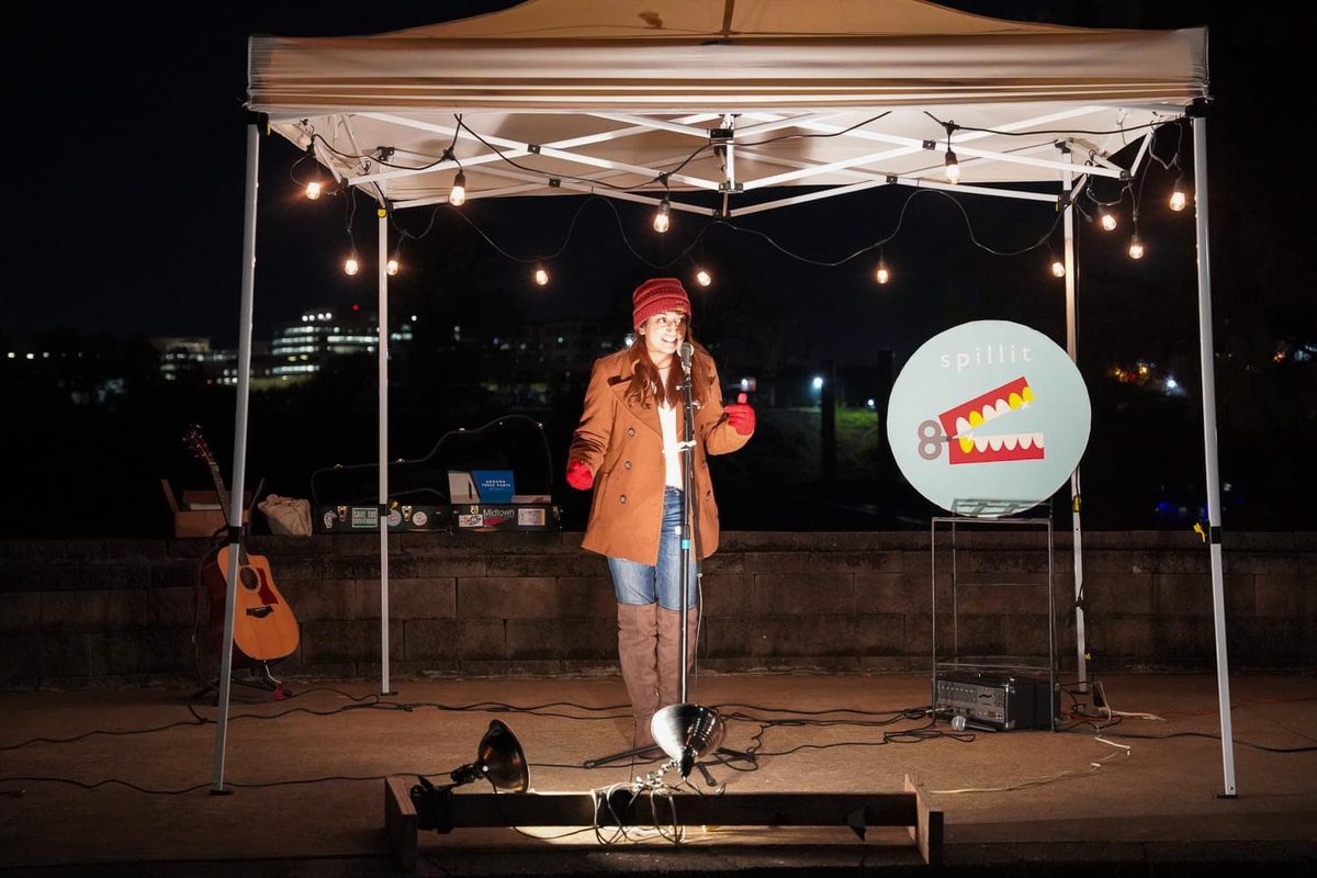 Jani performing at the Spill It storytelling competition